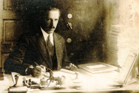 Mykola Swiderski st his desk as Mayor of Pochaiv